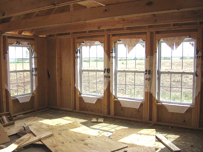 windows framed with Tyvek to inside